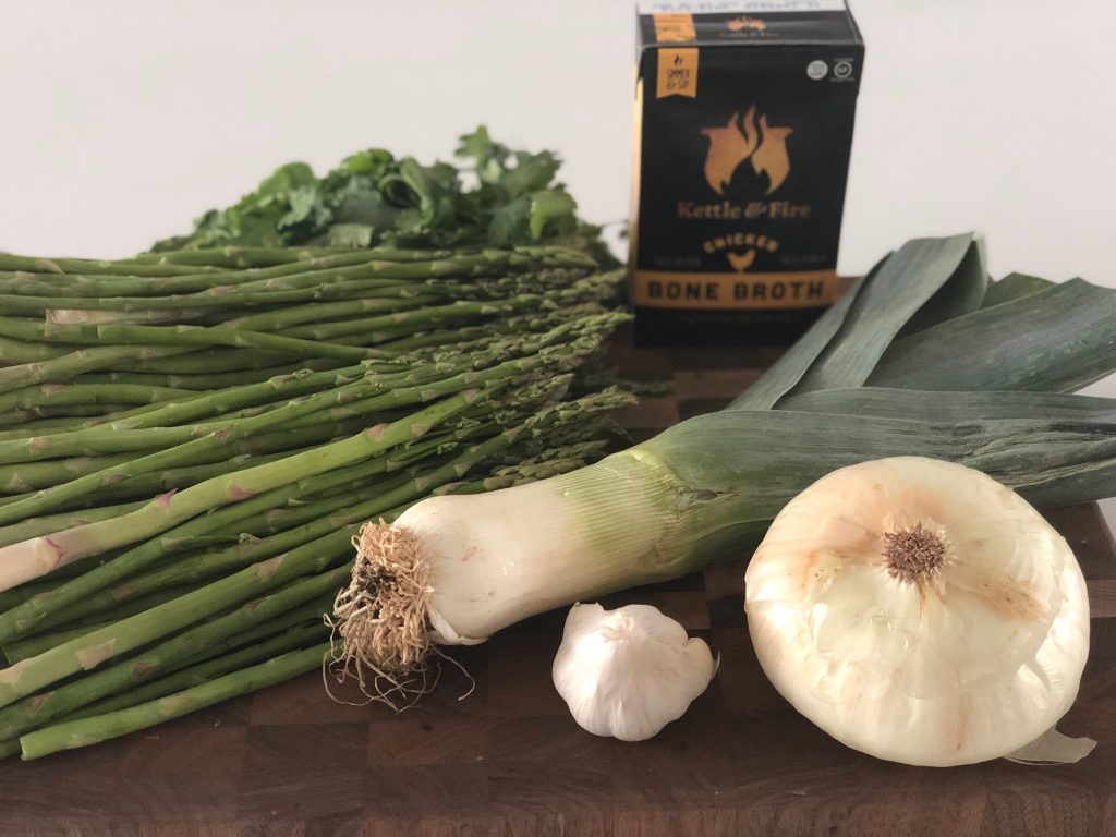 Creamy asparagus soup tastes like springtime in a bowl and it's dairy free, Paleo, Whole30 and vegan (if you use vegetable stock). One pot recipe.
