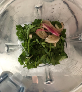 overhead shot of blender with vinaigrette ingredients
