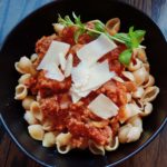 This Sausage & Mushroom Bolognese recipe can be whipped up in about an hour in an Instapot (pressure cooker.) Or make it on the stovetop or in a crockpot. - amiofbs.com