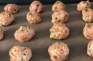 These healthy baked buffalo chicken meatballs are savory, spicy and oh so delicious. Serve them as an appetizer alongside sliced celery and carrots with a blue cheese dipping sauce. Or pile them on top of greens for a healthy and satisfying meal. | www.amiofbs.com