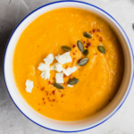You can make this Spicy Creamy African Peanut Soup on the stovetop or in an Instant Pot (pressure cooker.) It's rich and hearty with just the right amount of spice and it's dairy-free, sugar-free, gluten-free and can easily be made vegan or vegetarian. | www.amiofbs.com