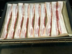 Here is the easiest way to make crispy sheet pan bacon in your oven with no mess. Try it and you'll never go back to standing over the stove. | www.amiofbs.com