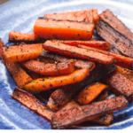 Smoky roasted carrots couldn't be easier, or more delicious. They're the ideal side dish for a quick and healthy weeknight dinner. Try this recipe today! | www.amiofbs.com