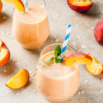 This Peaches & Cream Smoothie has it all – sweet peaches, vanilla, and LOTS protein. It packs an extra nutritious punch thanks to Kalona cottage cheese. | www.amiofbs.com