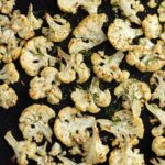This tumeric roasted cauliflower recipe combines to of today's hottest superfoods. Make it in 30 minutes on a sheet pan - it's ideal for a weeknight dinner. | www.amiofbs.com