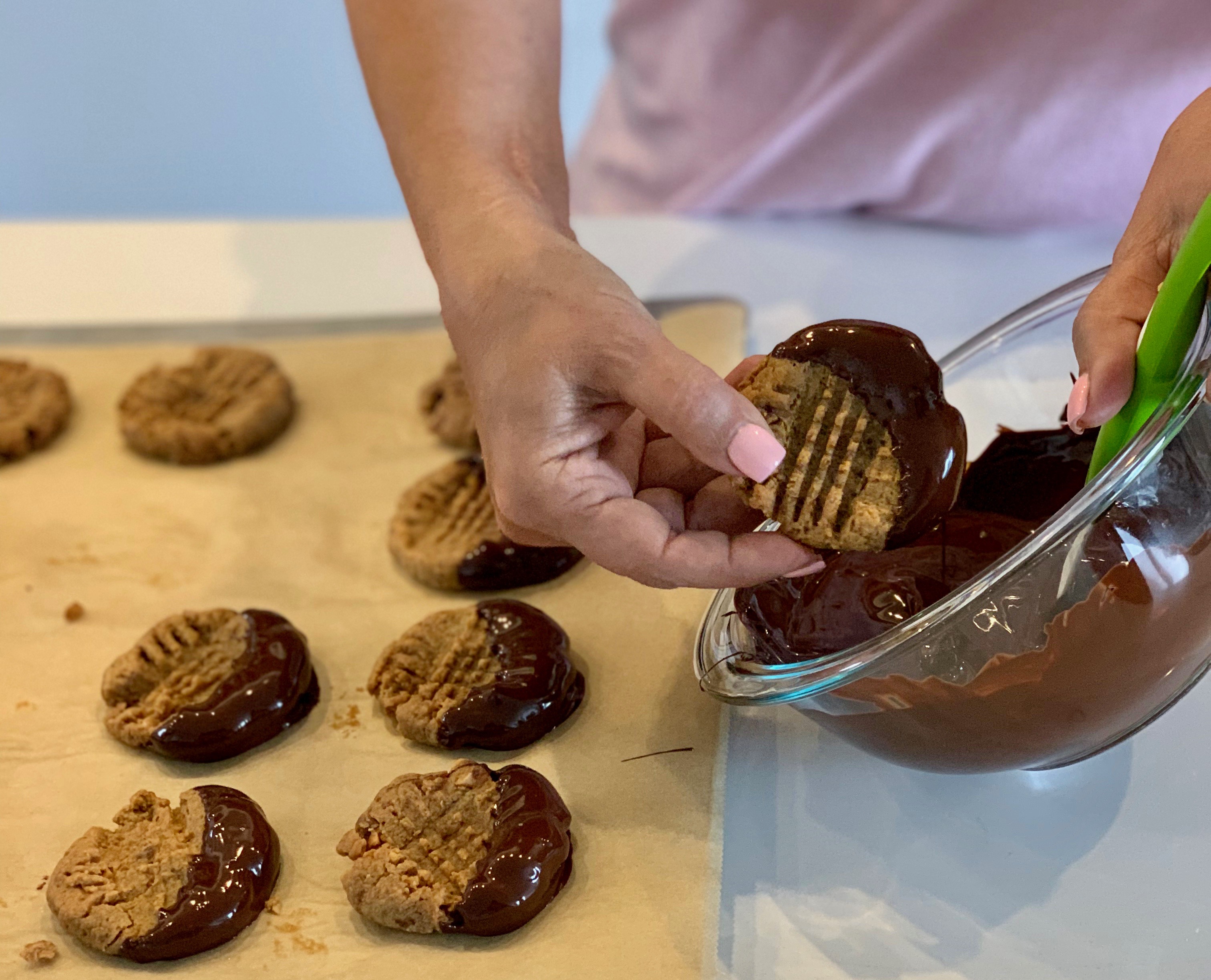 Chocolate dipped gluten-free peanut butter cookies so delicious you won't believe they are healthy (and easy to make!) No sugar, flour or dairy. | www.amiofbs.com