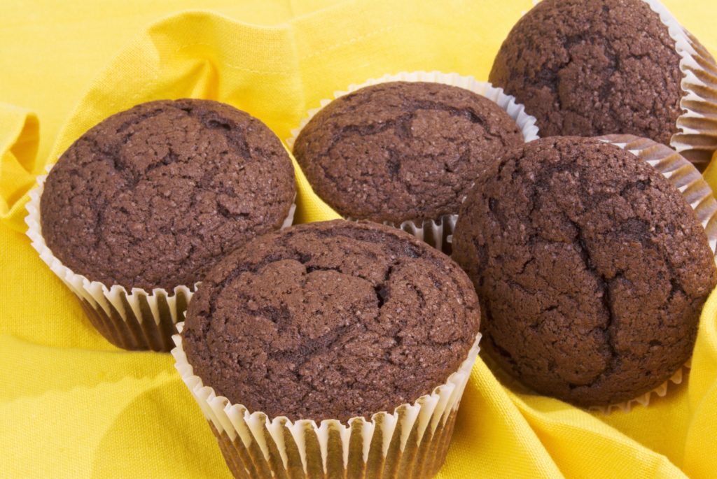 The BEST dark chocolate cupcake recipe! It's over-the-top delicious and can be made with gluten-free or all purpose flour. Top with whipped cream or your favorite frosting. | www.amiofbs.com