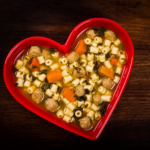 Italian Wedding Soup features a delectable combination of robust greens paired with a hearty broth and delicious pasta. Make it with or without meatballs. | www.amiofbs.com