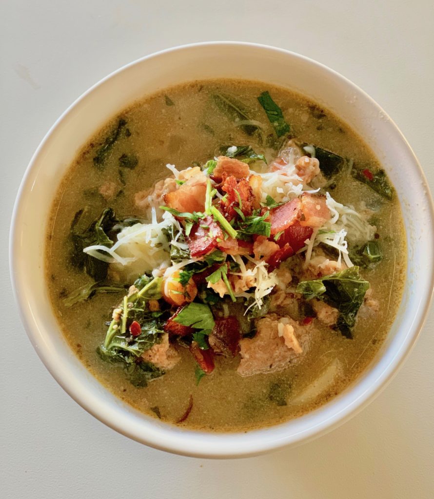 Olive Garden Copycat Whole30 Zuppa Toscana soup is a hearty mixture of sausage, potato, kale and lots of veggies. It's much healthier than the original Olive Garden version and even more delicious. Recipe is Whole30, dairy-free, sugar-free, keto & paleo. | www.amiofbs.com