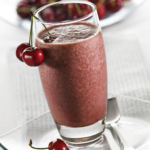 This delicious Chocolate Cherry Fab Four smoothie combines protein, healthy fat, fiber and greens to tickle your tastebuds and keep you full for hours. | www.amiofbs.com