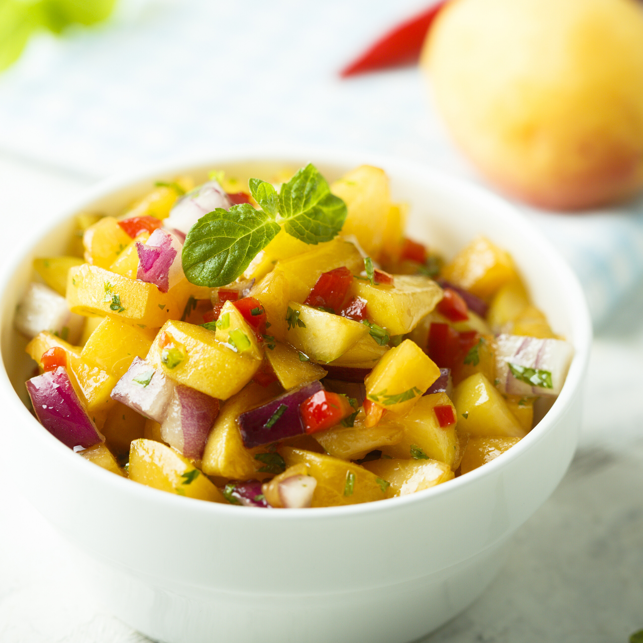 This sweet and savory Whole-30 3-ingredient fruit salsa elevates a simple grilled protein (chicken, fish, pork, steak), makes a great topping for tacos and burritos and is a delicious appetizer when served with chips. | www.amiofbs.com
