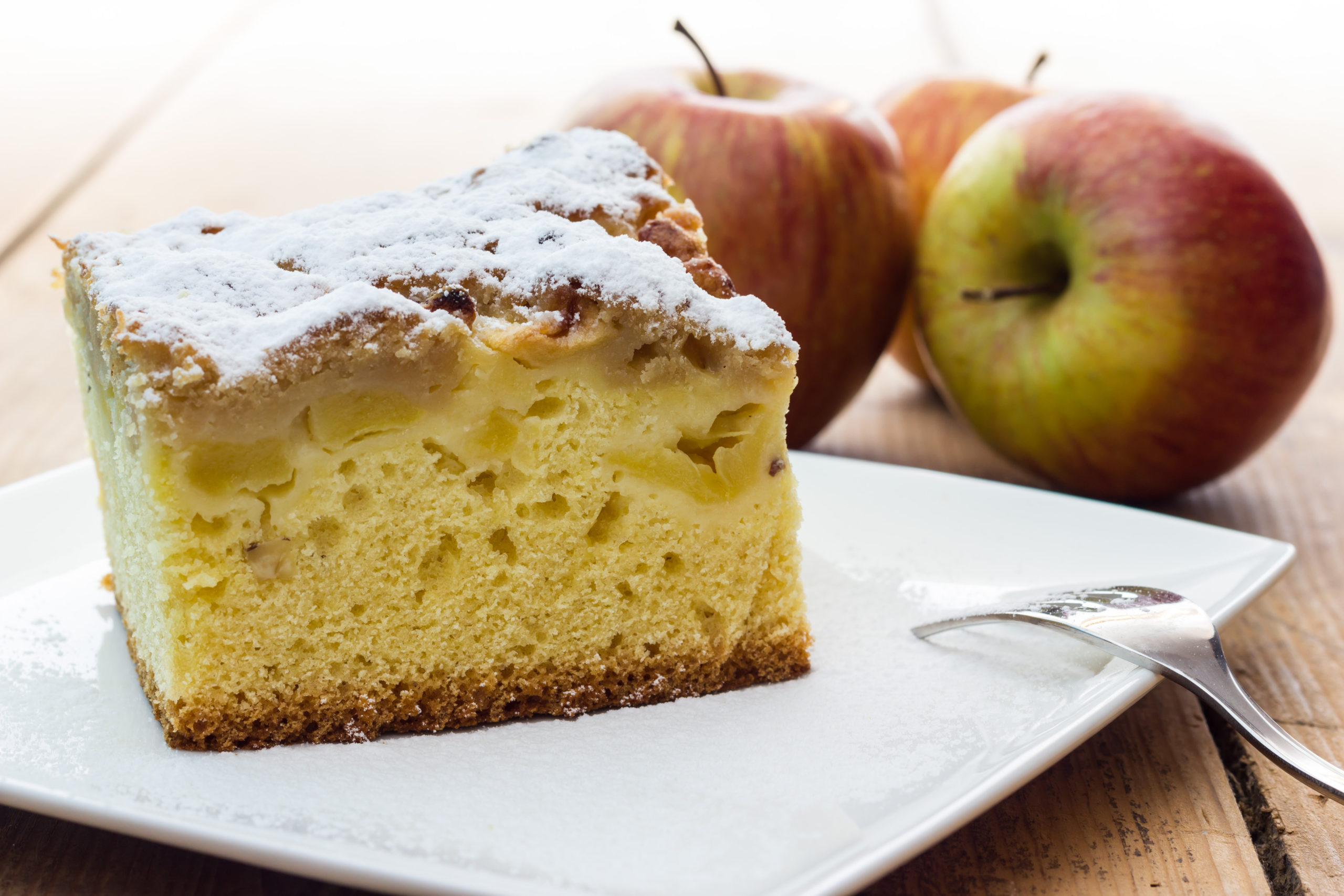 This light and fluffy buttermilk apple cake is a cross between a coffee cake and dessert. It's a yummy treat that isn't overly sweet.| www.amiofbs.com