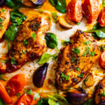 Honey Harissa Sheet Pan Chicken & Vegetables is so versatile and easy that it'll become your favorite weeknight dinner recipe. Try it! | www.amiofbs.com