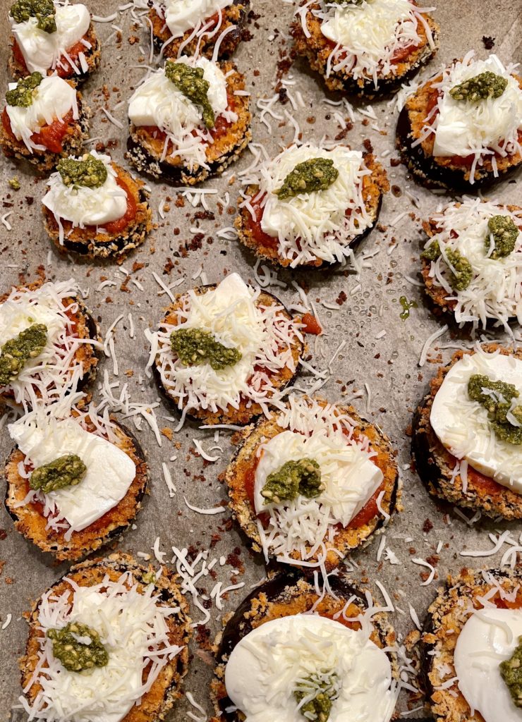 Say goodbye to mushy eggplant. This Easy Cheesy Sheet Pan Eggplant Parmesan ensures that every bite is the perfect mix of crunchy, saucy and cheesy goodness! | www.amiofbs.com