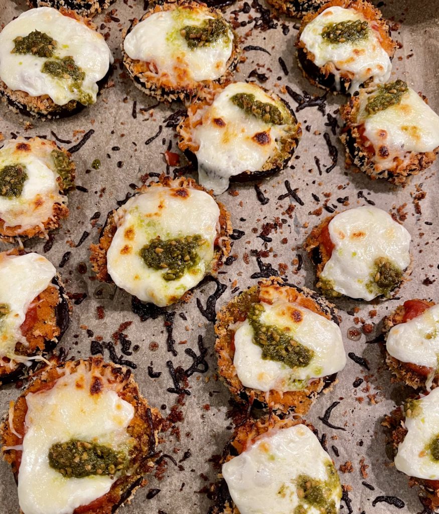 Say goodbye to mushy eggplant. This Easy Cheesy Sheet Pan Eggplant Parmesan ensures that every bite is the perfect mix of crunchy, saucy and cheesy goodness! | www.amiofbs.com