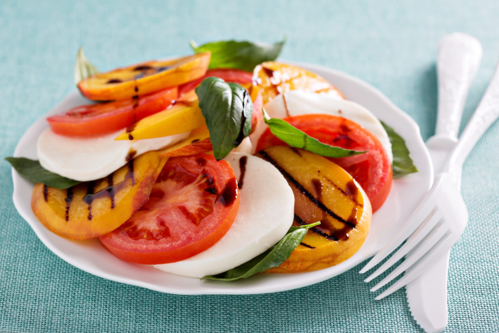 There's a saying that goes "What grows together, goes together." With peaches and tomatoes in season and plentiful, this super simple Peach and Tomato Caprese Salad is a lovely way to enjoy them. Just four ingredients and it's on the table in minutes. | www.amiofbs.com