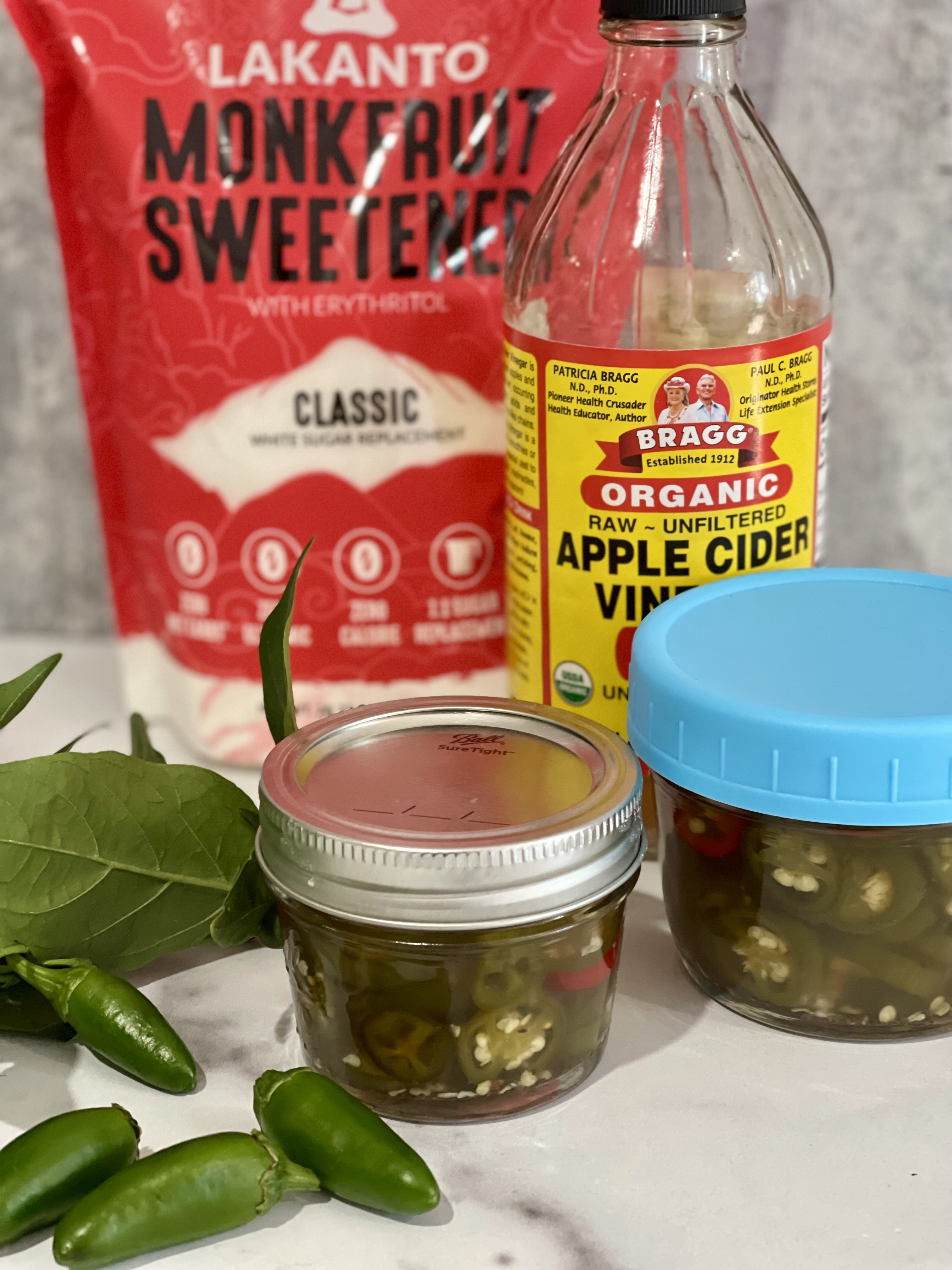 Discover how to make Sugar-Free Candied Jalapeños using no calorie monkfruit sweetener instead of sugar. They're sweet and spicy and virtually indistinguishable from the store-bought version. | www.amiofbs