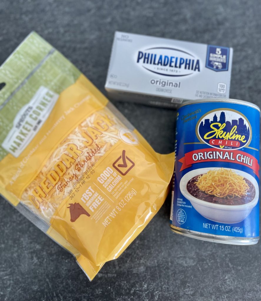 If you've visited Cincinnati, you likely tried iconic Skyline chili. Skyline Chili Dip is an easy, three-ingredient, cheesy appetizer that's sure to please. | www.amiofbs.com