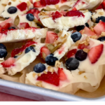 Creamy frozen yogurt bark is a protein-packed treat everyone will love. It's made with just a few ingredients & it's infinitely customizable. | www.amiofbs.com