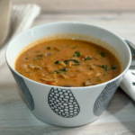 Creamy mushroom and kale soup is vegetarian comfort food. It's so rich and hearty! Serve it as soup or ladle it over polenta or mashed potatoes. | www.amiofbs.com