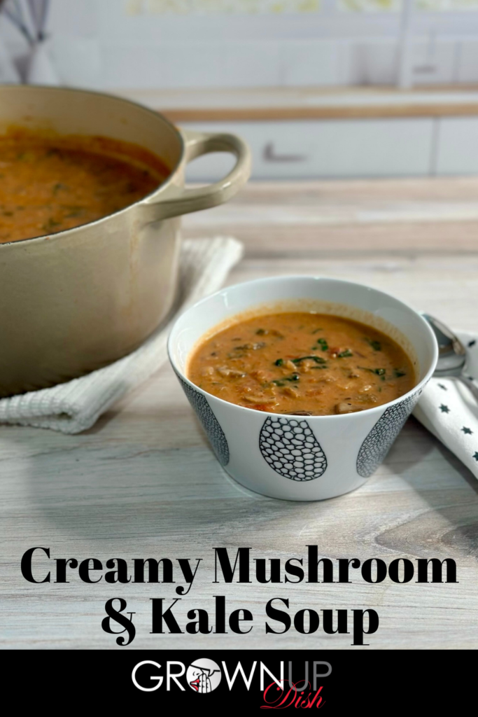 Creamy mushroom kale soup is vegetarian comfort food. It's so rich and hearty! Serve it as soup or ladle it over polenta or mashed potatoes. | www.amiofbs.com