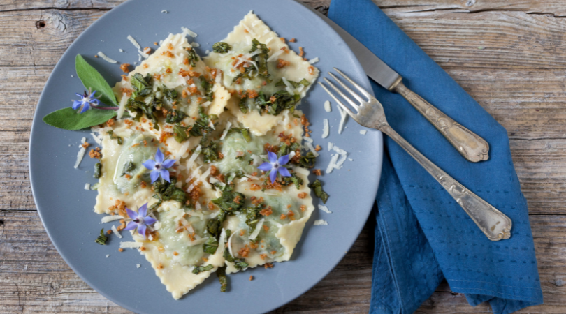Creamy ravioli with spring vegetables is a delicious vegetarian recipe. It's a healthy easy meal packed with flavor and nutrients. | www.amiofbs.com